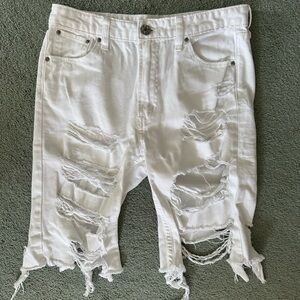 BDG ripped white denim Bermuda shorts